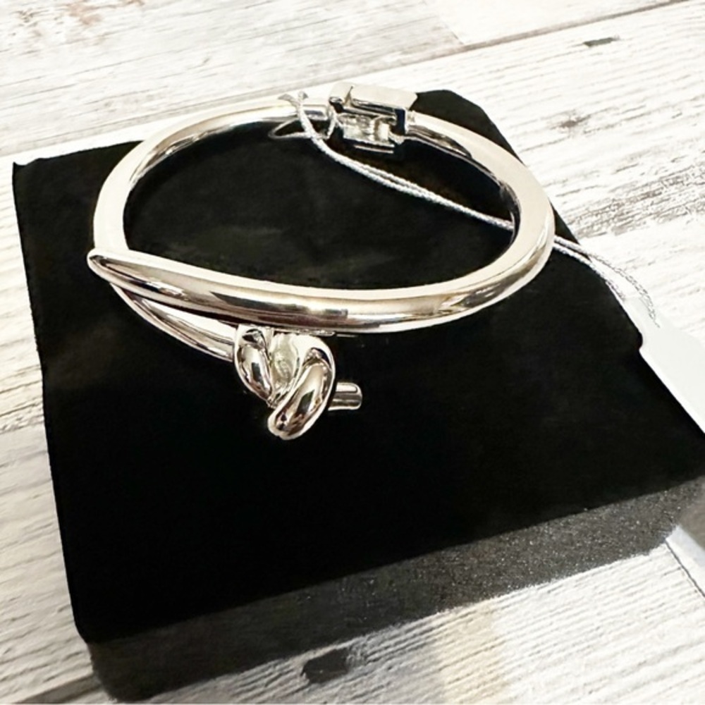EyeCandy Los Angeles silvertone knot hinged bangle bracelet NWT